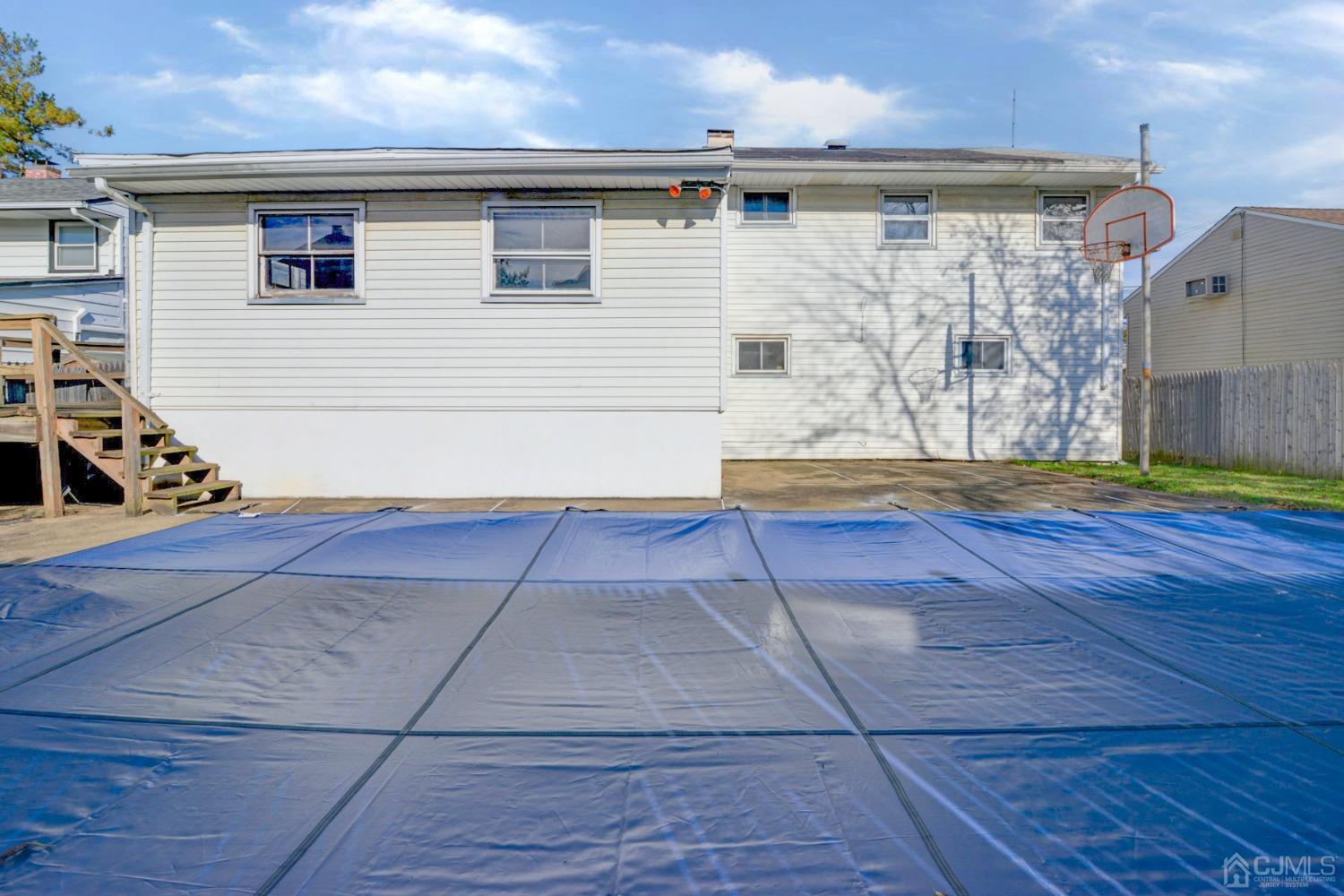 537 Ford Avenue Fords, NJ 08863 - Photo 29 of 31 a view of backyard with door
