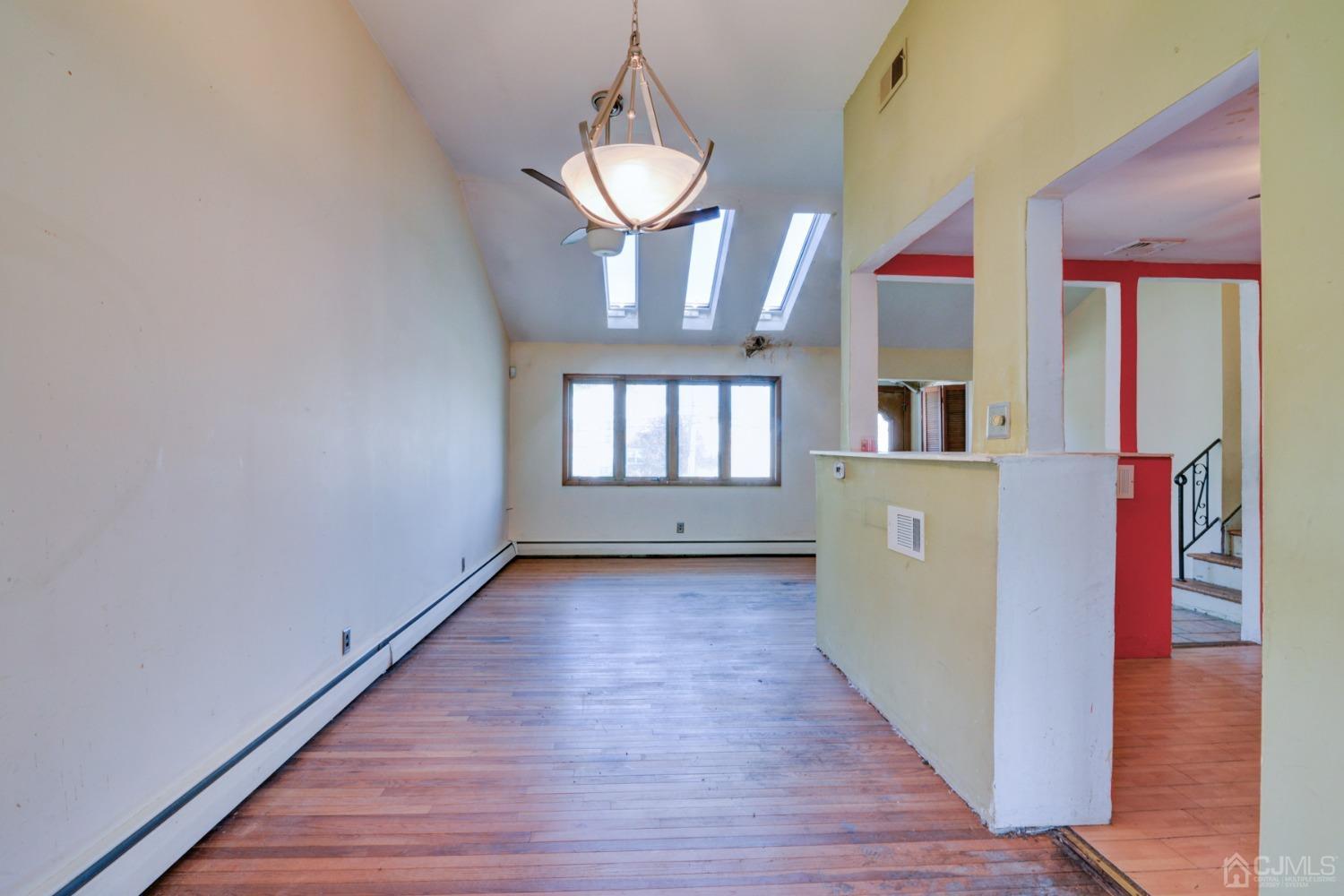 537 Ford Avenue Fords, NJ 08863 - Photo 10 of 31 a view of entryway and hall with wooden floor