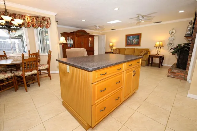 a kitchen with stainless steel appliances granite countertop a sink and cabinets