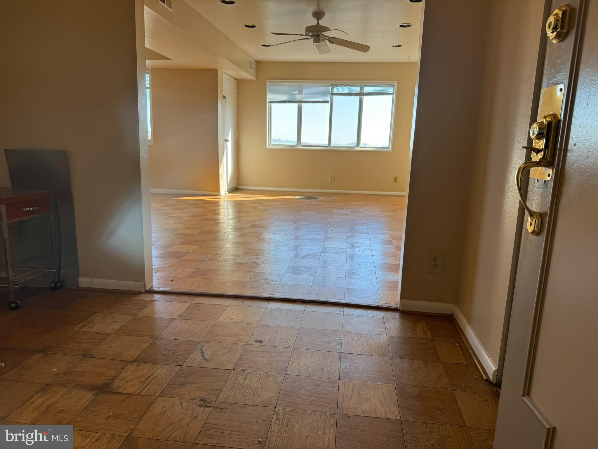 5340 Holmes Run Parkway, Unit 1215 Alexandria, VA 22304 - Photo 2 of 14 an empty room with windows