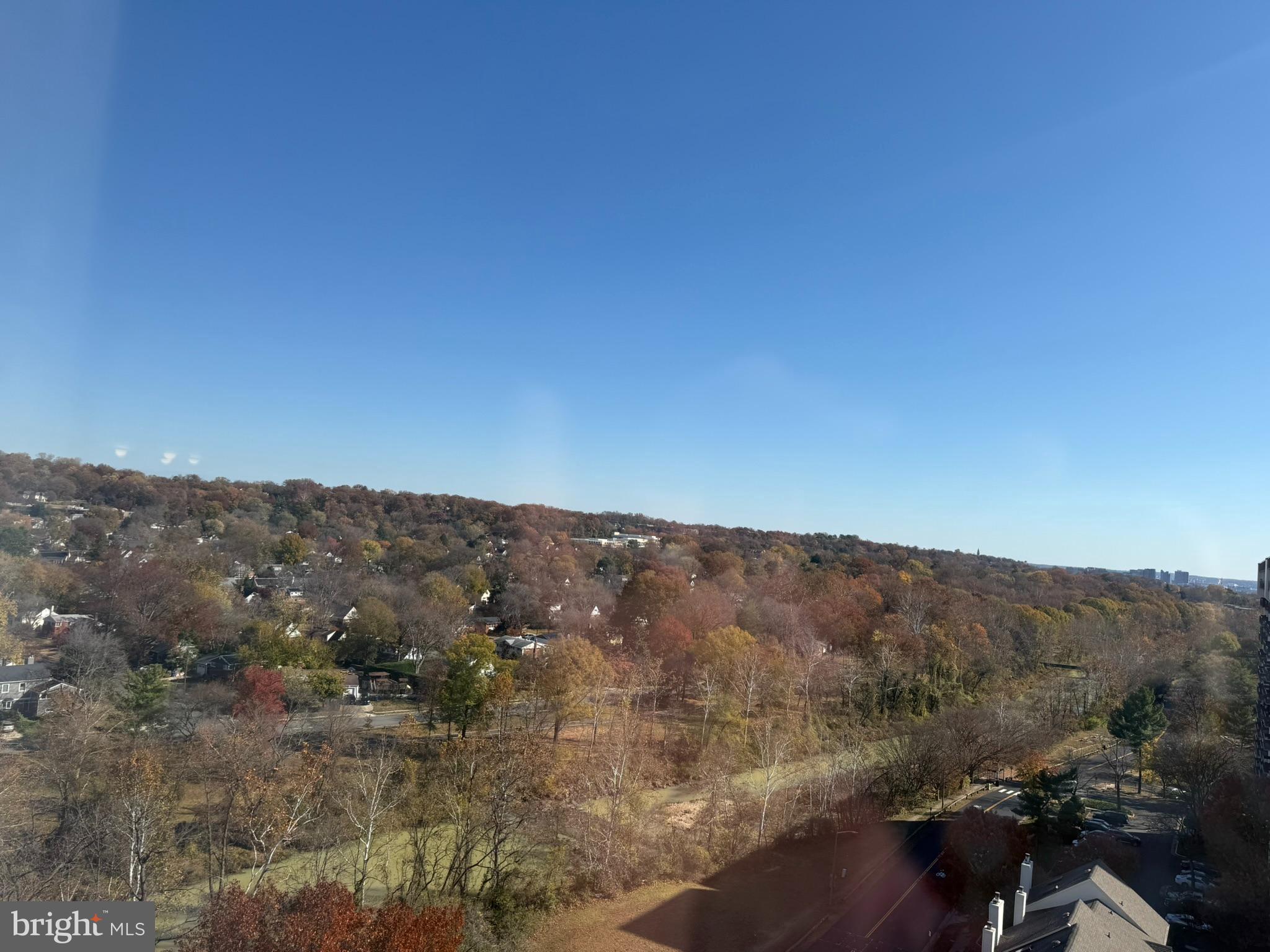 5340 Holmes Run Parkway, Unit 1215 Alexandria, VA 22304 - Photo 4 of 14 a view of a mountain range with trees in the background