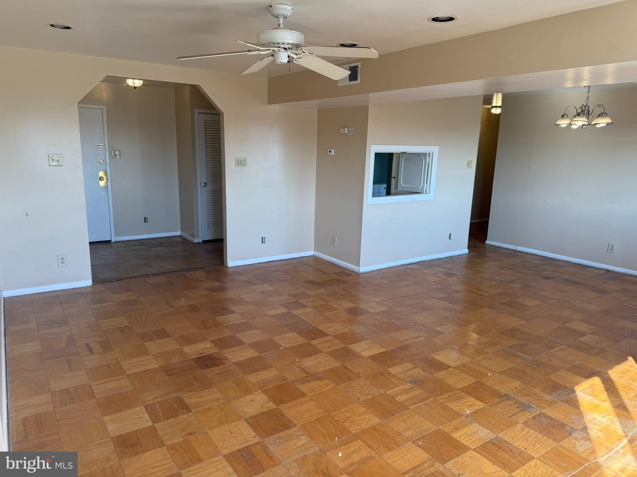 5340 Holmes Run Parkway, Unit 1215 Alexandria, VA 22304 - Photo 6 of 14 an empty room with a bathroom and a chandelier fan