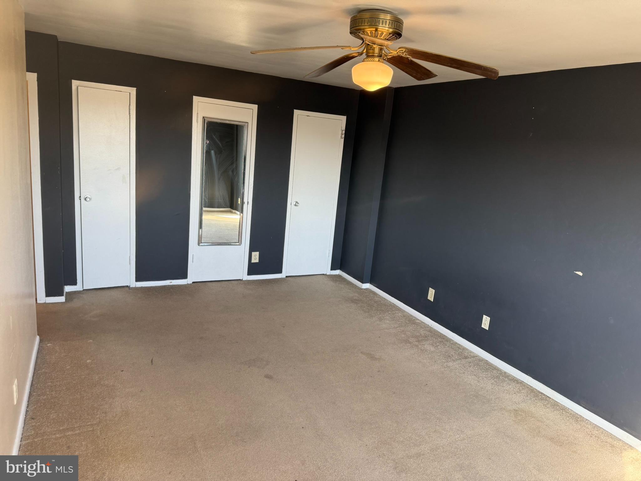 5340 Holmes Run Parkway, Unit 1215 Alexandria, VA 22304 - Photo 10 of 14 a view of a livingroom with a chandelier fan and a window