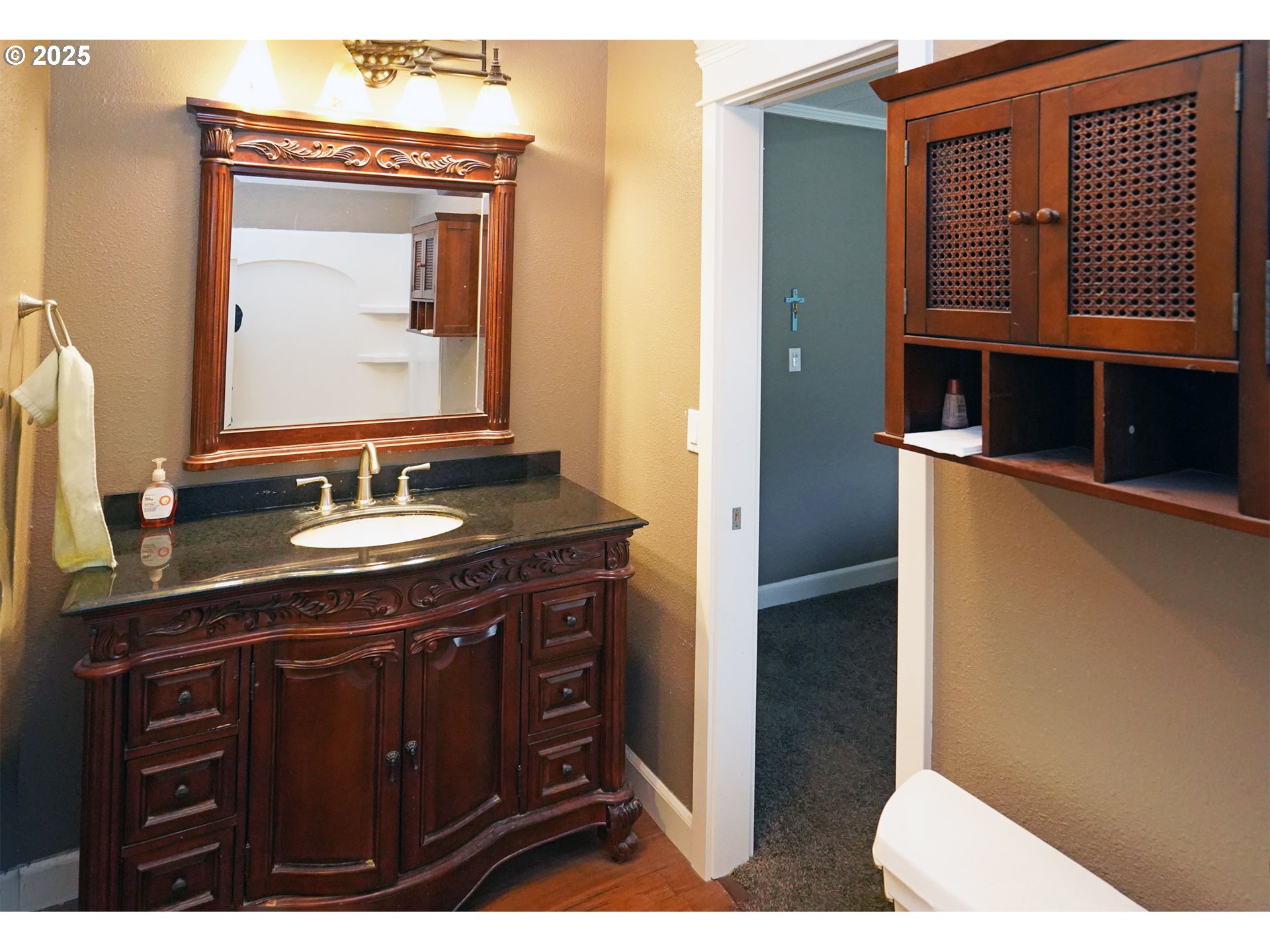 15411 Southeast Mill Plain Boulevard, Unit D3 Vancouver, WA 98684 - Photo 13 of 23 a bathroom with a sink and a mirror