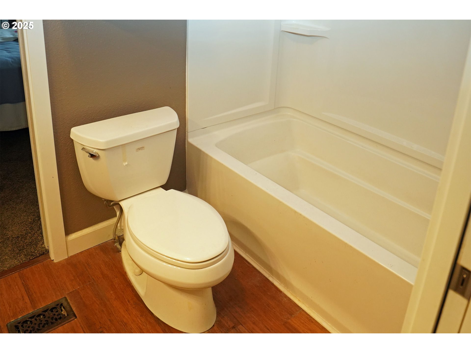 15411 Southeast Mill Plain Boulevard, Unit D3 Vancouver, WA 98684 - Photo 14 of 23 a bathroom with a toilet and a shower