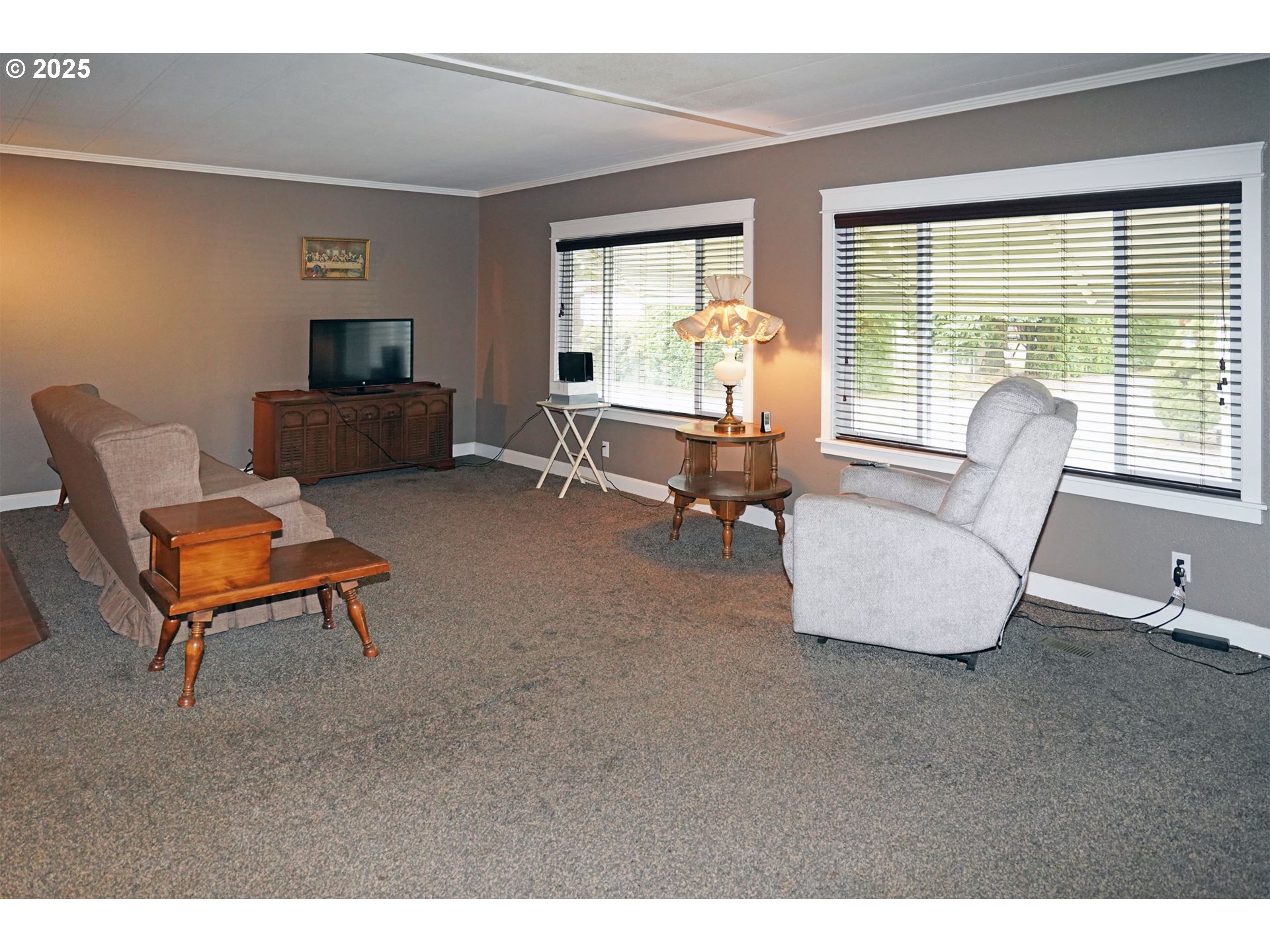 15411 Southeast Mill Plain Boulevard, Unit D3 Vancouver, WA 98684 - Photo 6 of 23 a living room with furniture and a large window