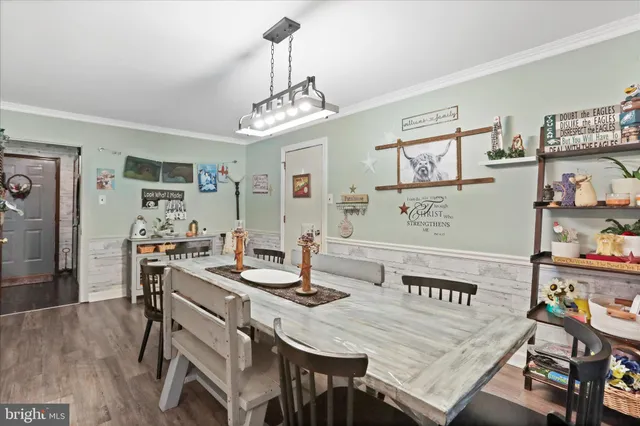a view of a dining room with furniture