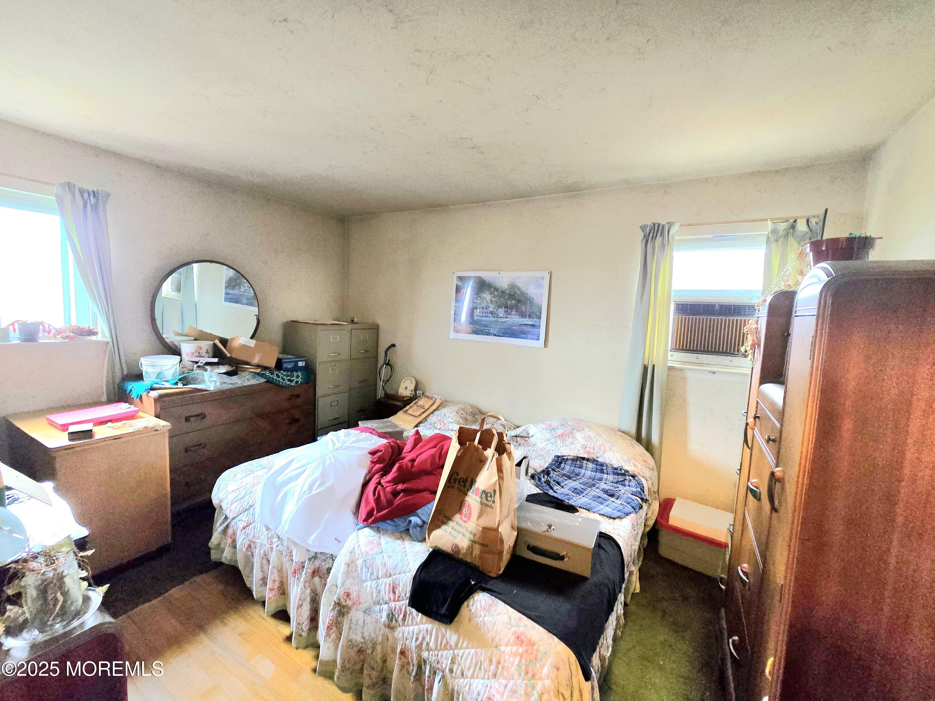 588 Pennsylvania Avenue Brick, NJ 08724 - Photo 18 of 30 a bedroom with a bed and wooden floor