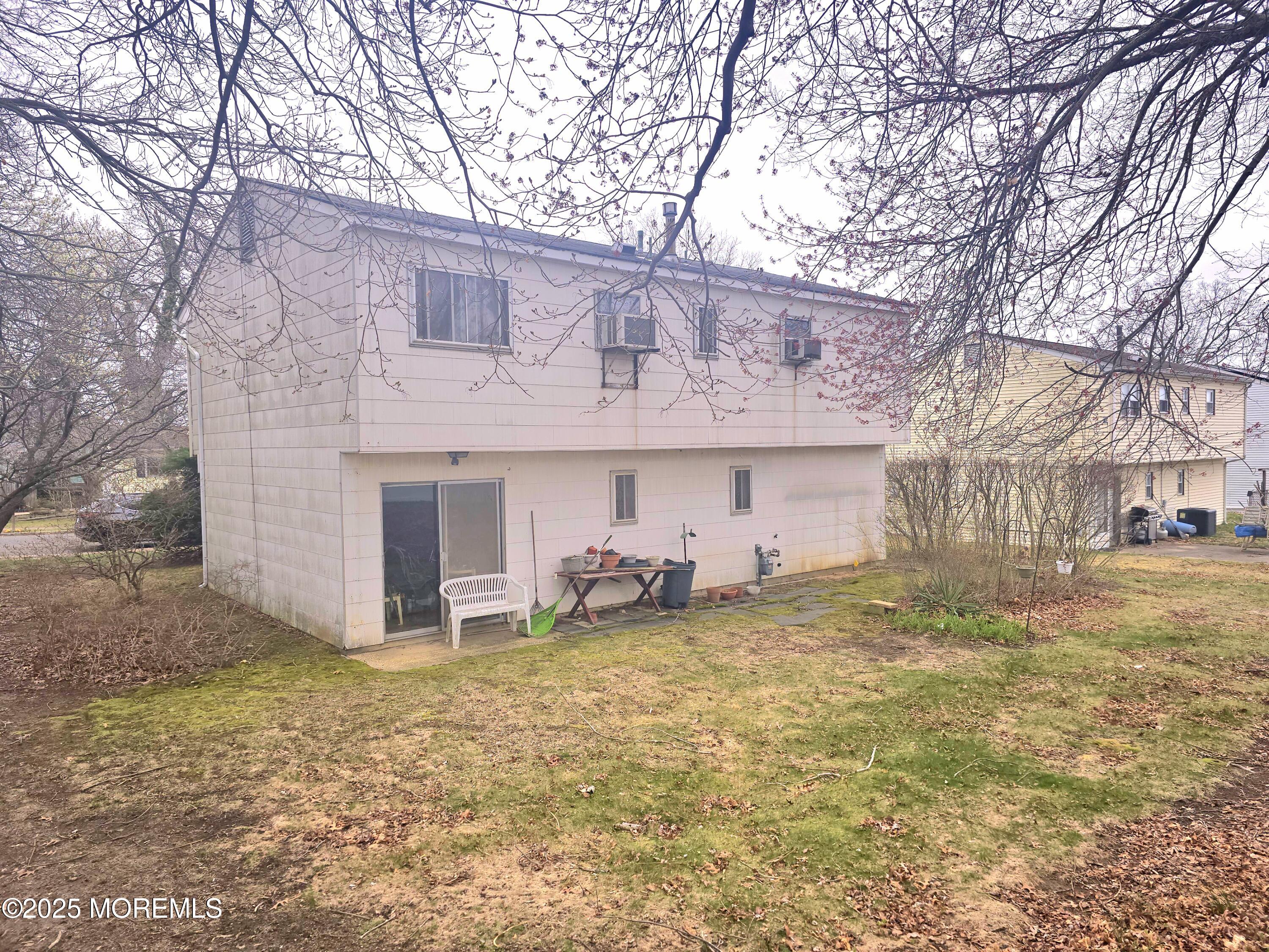 588 Pennsylvania Avenue Brick, NJ 08724 - Photo 3 of 30 a view of a house with a yard