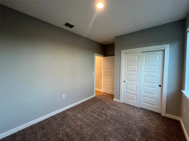 an empty room with closet