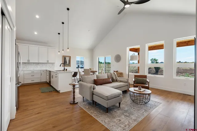 a kitchen with a refrigerator sink and stainless steel appliances