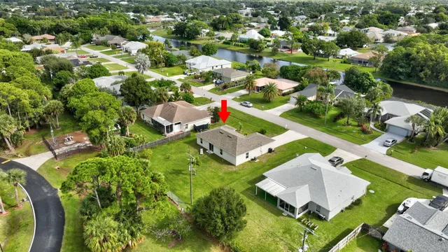 an aerial view of a house with a garden