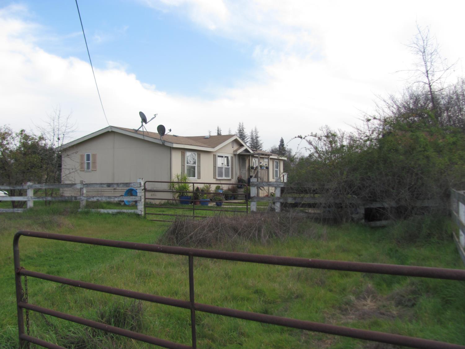 12501 Lee School Road Wilton, CA 95693 - Photo 6 of 18 a view of a house with a yard