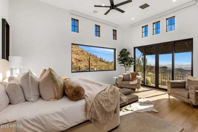 a spacious bathroom with a double vanity sink and a mirror