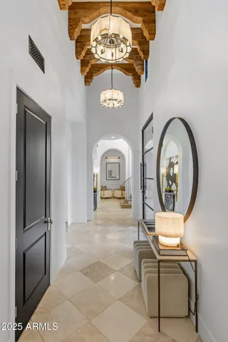 a bedroom with a bed and a flat tv screen