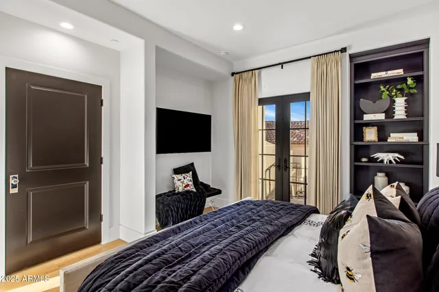 a bathroom with a double vanity sink mirror and shower