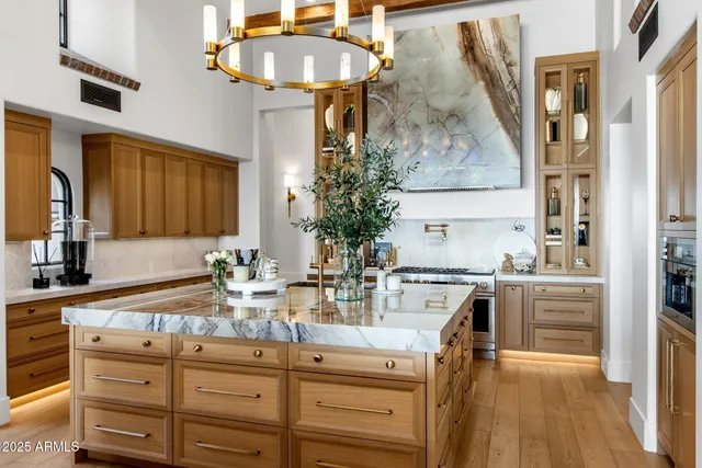 a kitchen with cabinets a sink and appliances