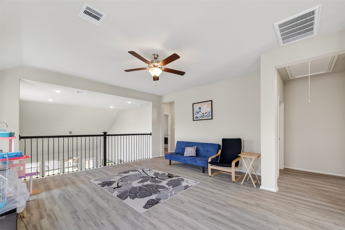 2739 Meadow View Lane Conroe, TX 77385 - Photo 16 of 50 a living room with furniture a rug and a window