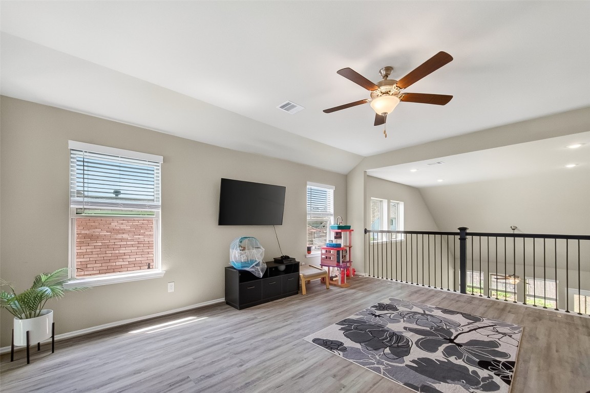 2739 Meadow View Lane Conroe, TX 77385 - Photo 17 of 50 a bedroom with furniture and a window