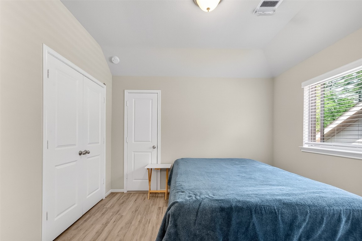 2739 Meadow View Lane Conroe, TX 77385 - Photo 21 of 50 a bedroom with a bed and a window