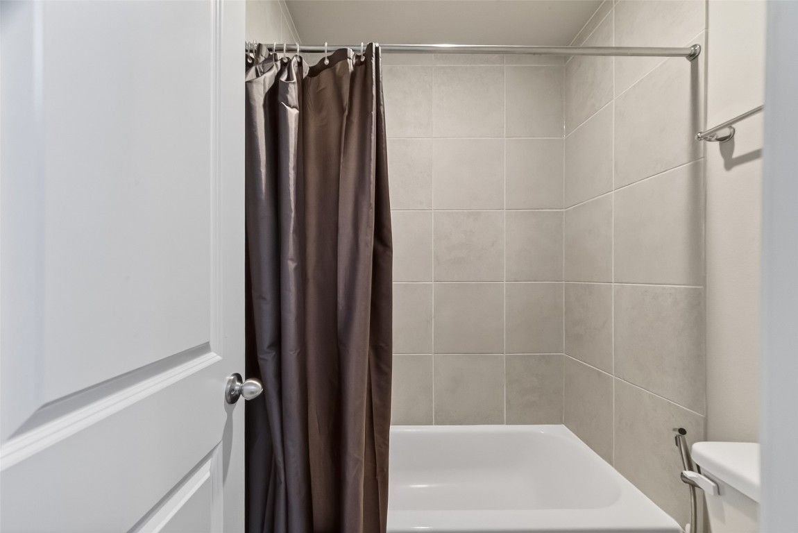 2739 Meadow View Lane Conroe, TX 77385 - Photo 24 of 50 a bathroom with a shower and a bath tub