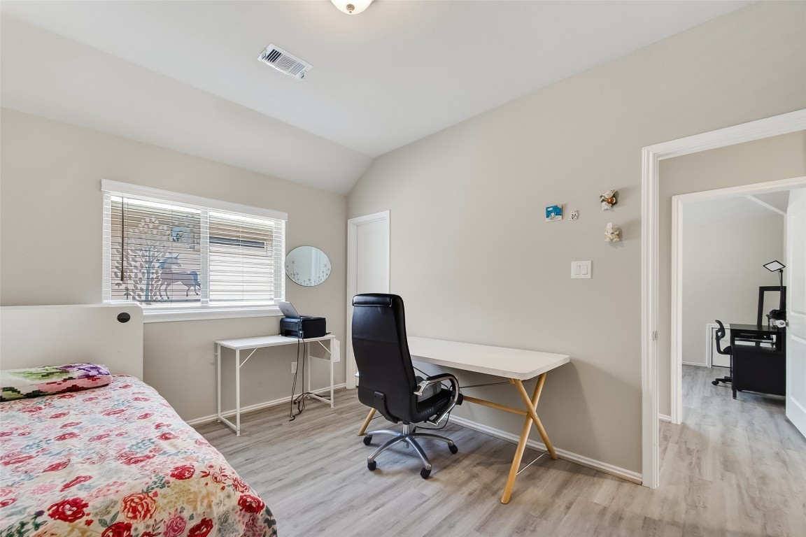 2739 Meadow View Lane Conroe, TX 77385 - Photo 25 of 50 a view of a workspace with furniture and a window