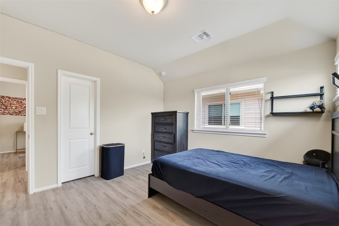 2739 Meadow View Lane Conroe, TX 77385 - Photo 29 of 50 a bedroom with a bed and a window