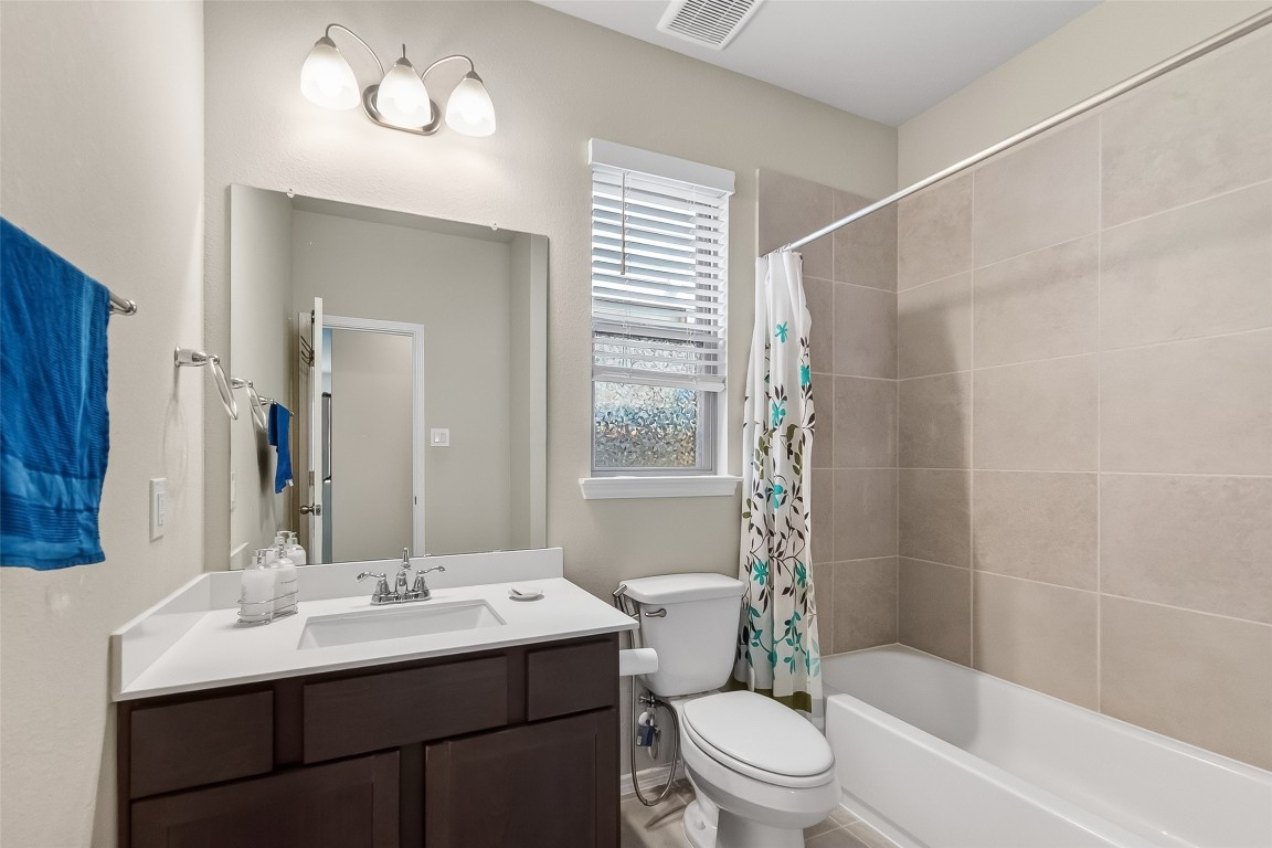 2739 Meadow View Lane Conroe, TX 77385 - Photo 40 of 50 a bathroom with a sink a toilet and shower