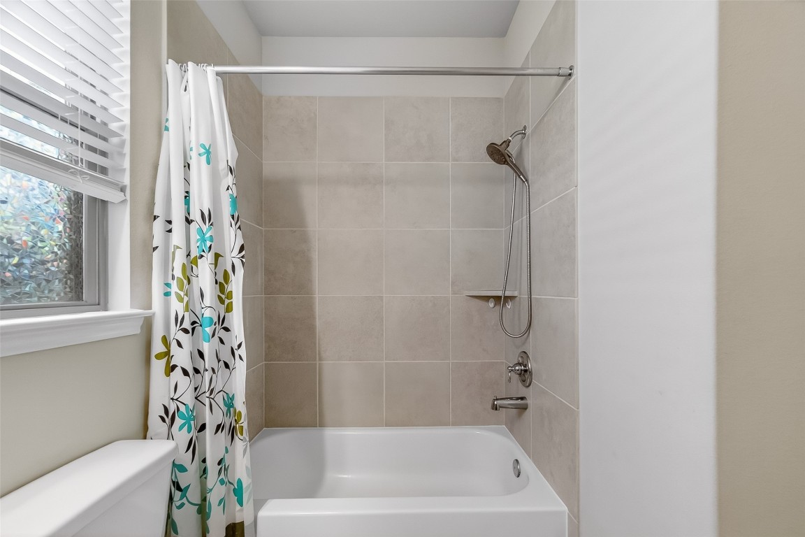 2739 Meadow View Lane Conroe, TX 77385 - Photo 41 of 50 a bathroom with a bathtub and shower