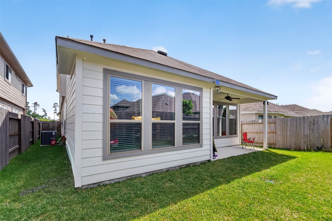 2739 Meadow View Lane Conroe, TX 77385 - Photo 42 of 50 a view of a back yard of the house