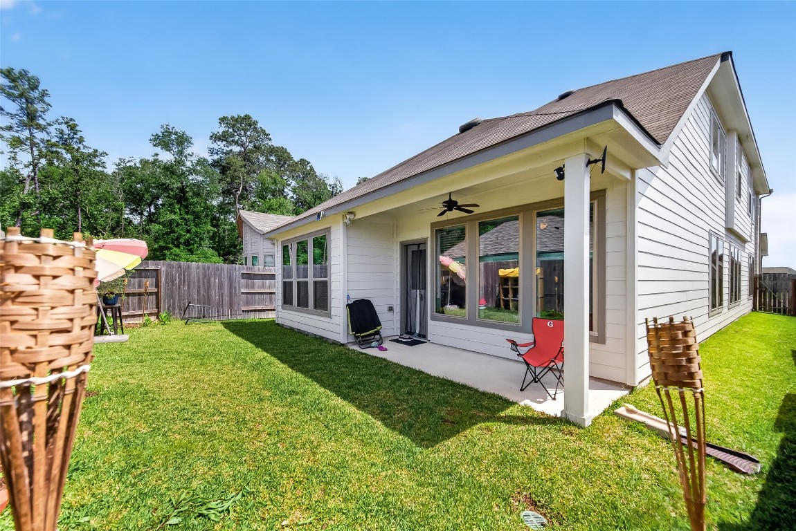 2739 Meadow View Lane Conroe, TX 77385 - Photo 43 of 50 a view of a house with backyard