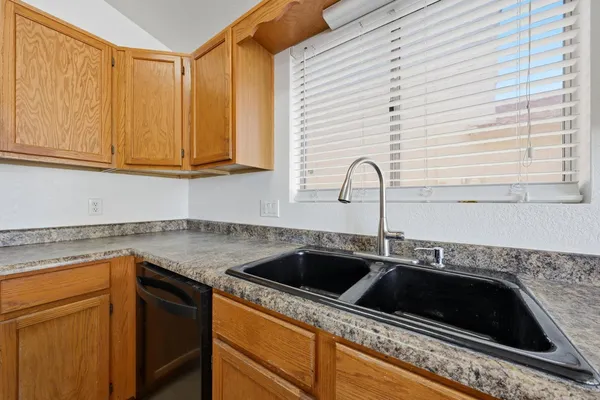 a view of a back yard of the house