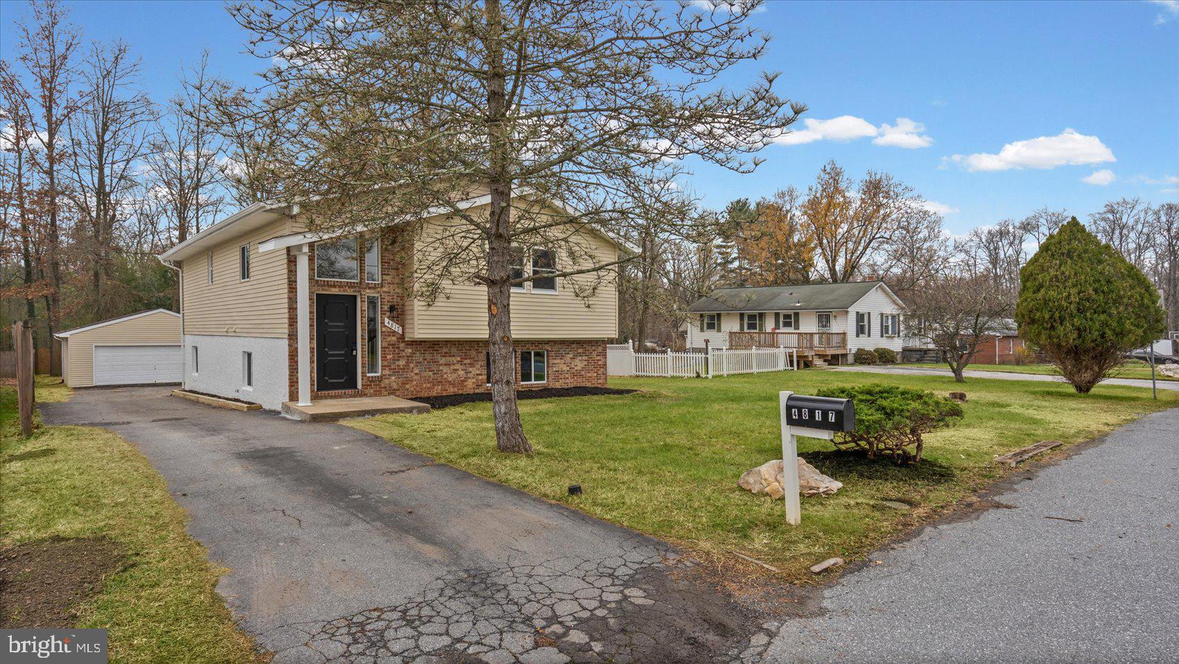 4817 Valley Forge Road Randallstown, MD 21133 - Photo 36 of 36 a view of a house with a back yard