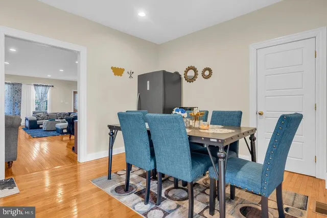 a view of a dining room with furniture and a table