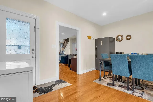 a view of a livingroom with furniture and a flat screen tv