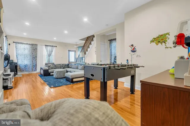 a living room with furniture and a table