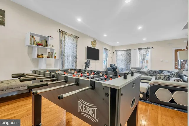 a view of a room with furniture and window