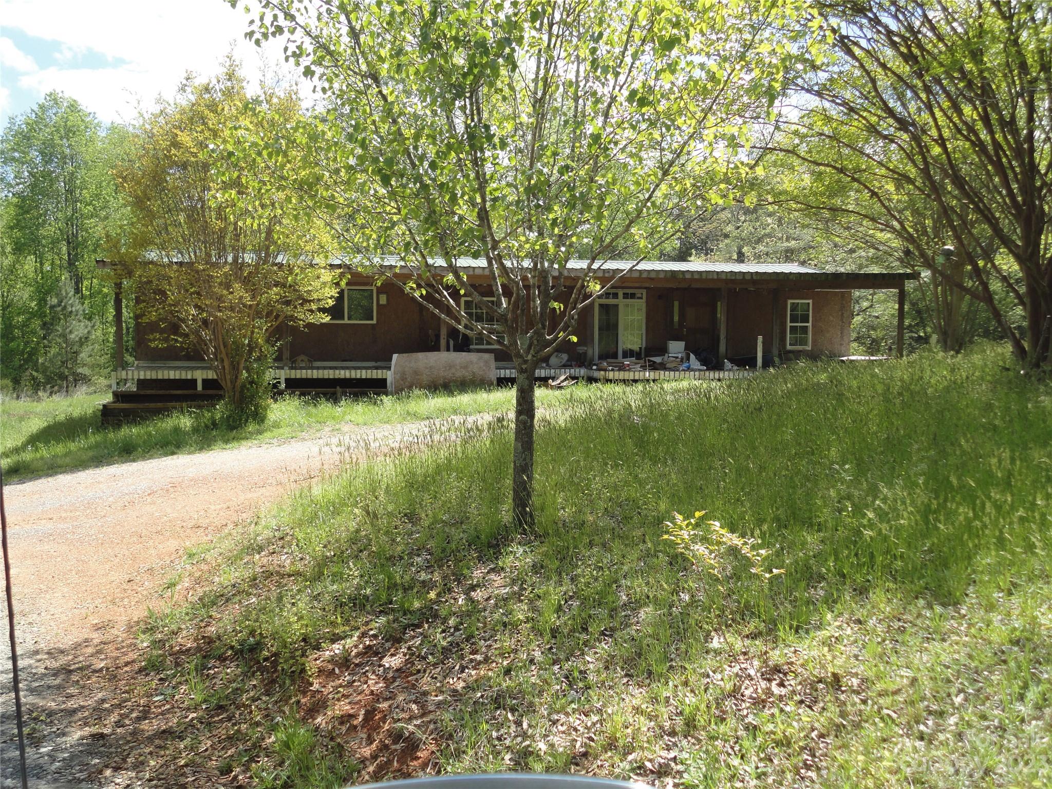 5063 Crouse Road Crouse, NC 28033 - Photo 1 of 1 a backyard of a house with yard and trampoline