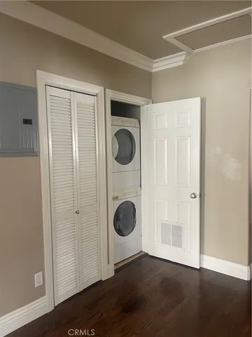 a view of a storage & utility room with wooden floor