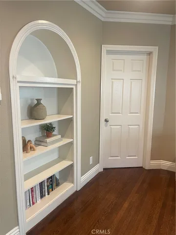 a view of a livingroom with wooden floor