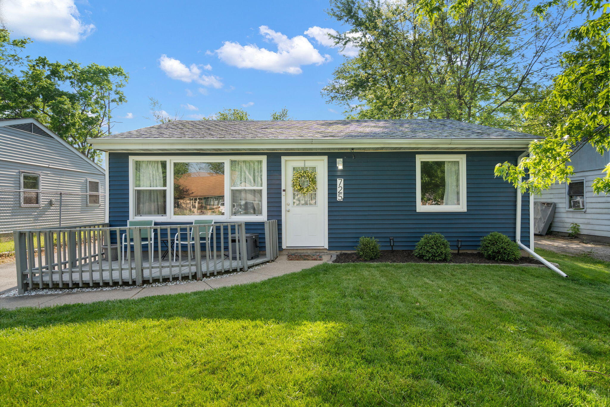 725 Juniper Road Valparaiso, IN 46385 - Photo 2 of 21 a view of a house with a yard and deck