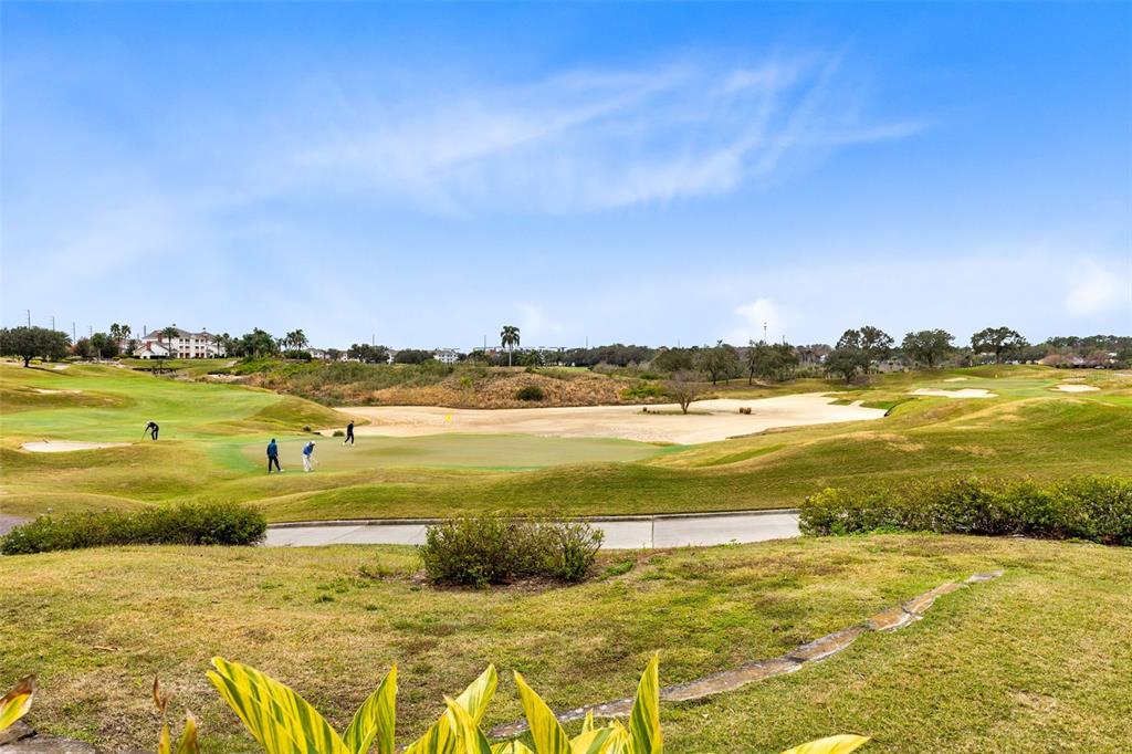 1368 Centre Ct Ridge Drive, Unit 104 Reunion, FL 34747 - Photo 25 of 33 a view of an ocean and beach
