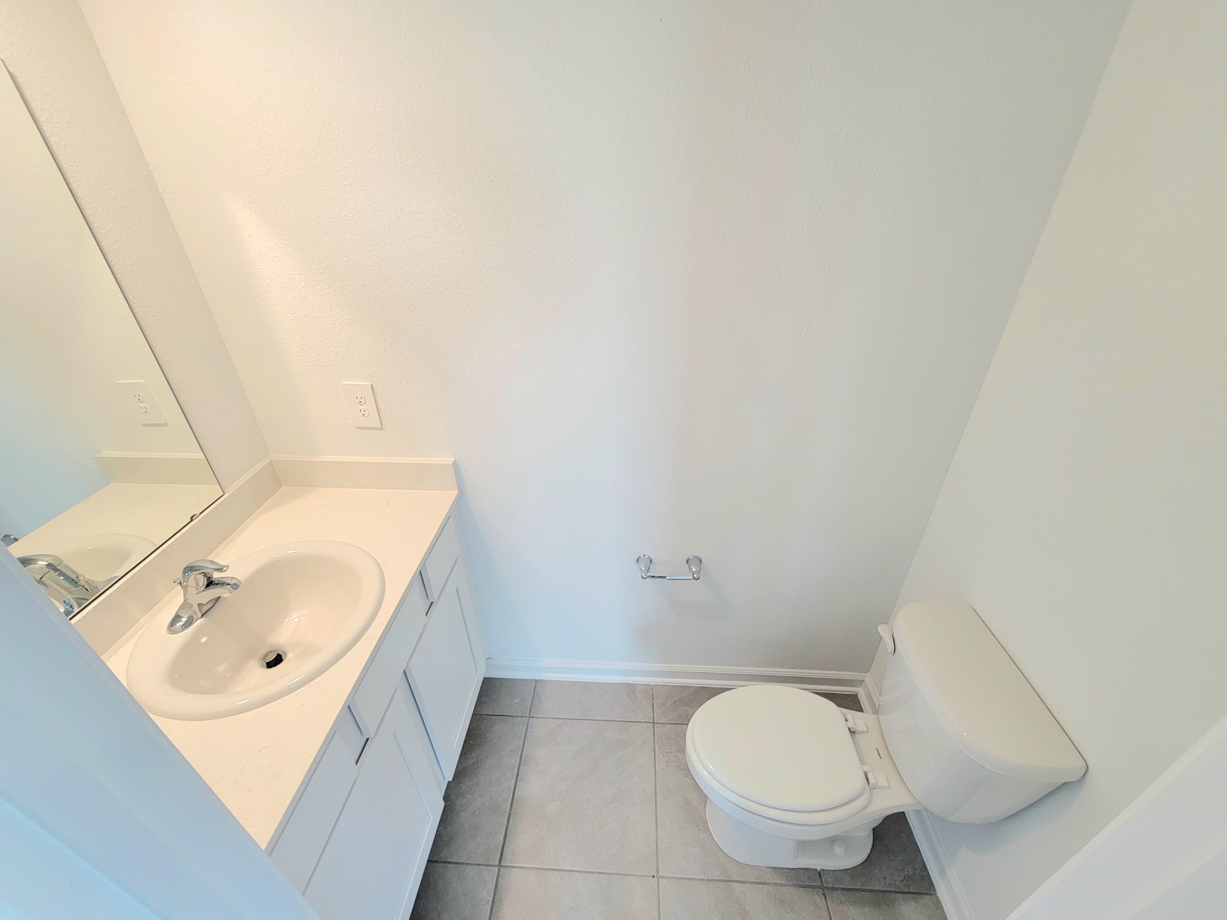177 Tidal Bch Avenue St. Augustine, FL 32095 - Photo 11 of 39 a bathroom with a sink and a toilet
