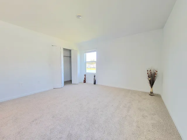 a view of empty room with windows