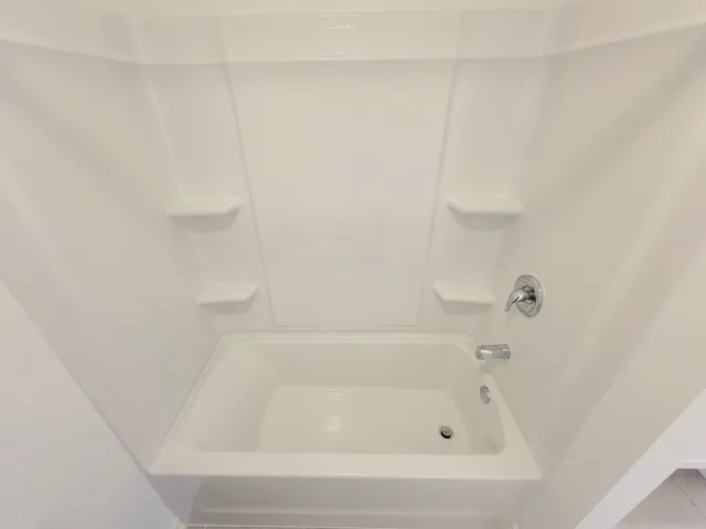 a close up of a bathtub