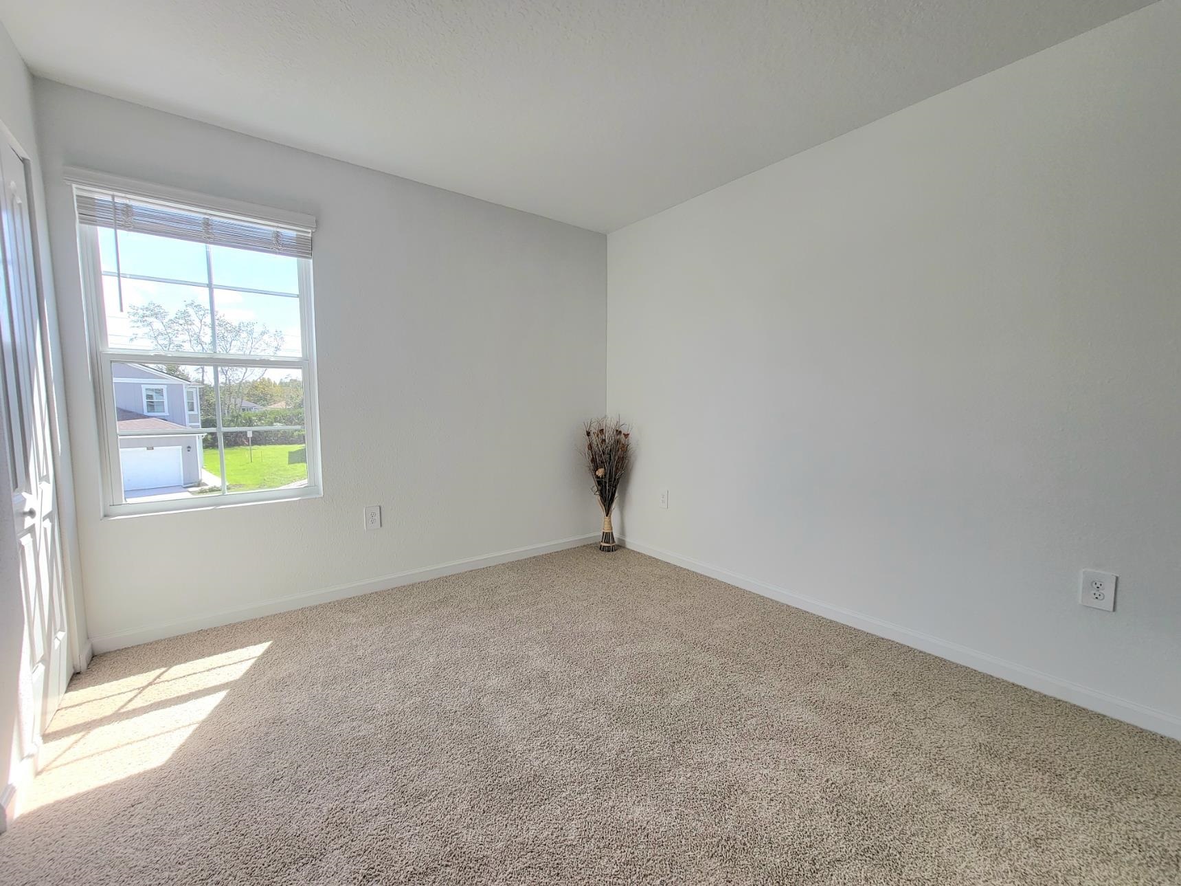 177 Tidal Bch Avenue St. Augustine, FL 32095 - Photo 8 of 39 a view of an empty room and window