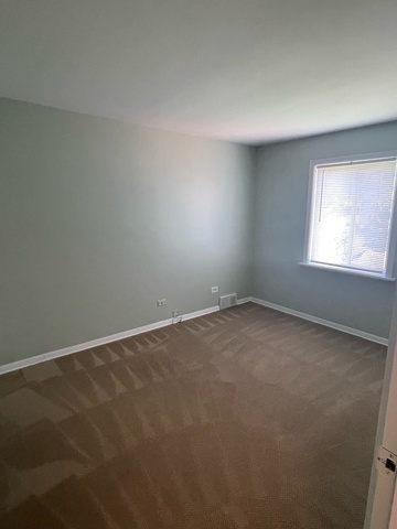 961 Spring Road Elmhurst, IL 60126 - Photo 15 of 24 an empty room with a window