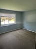 961 Spring Road Elmhurst, IL 60126 - Photo 16 of 24 an empty room with a window