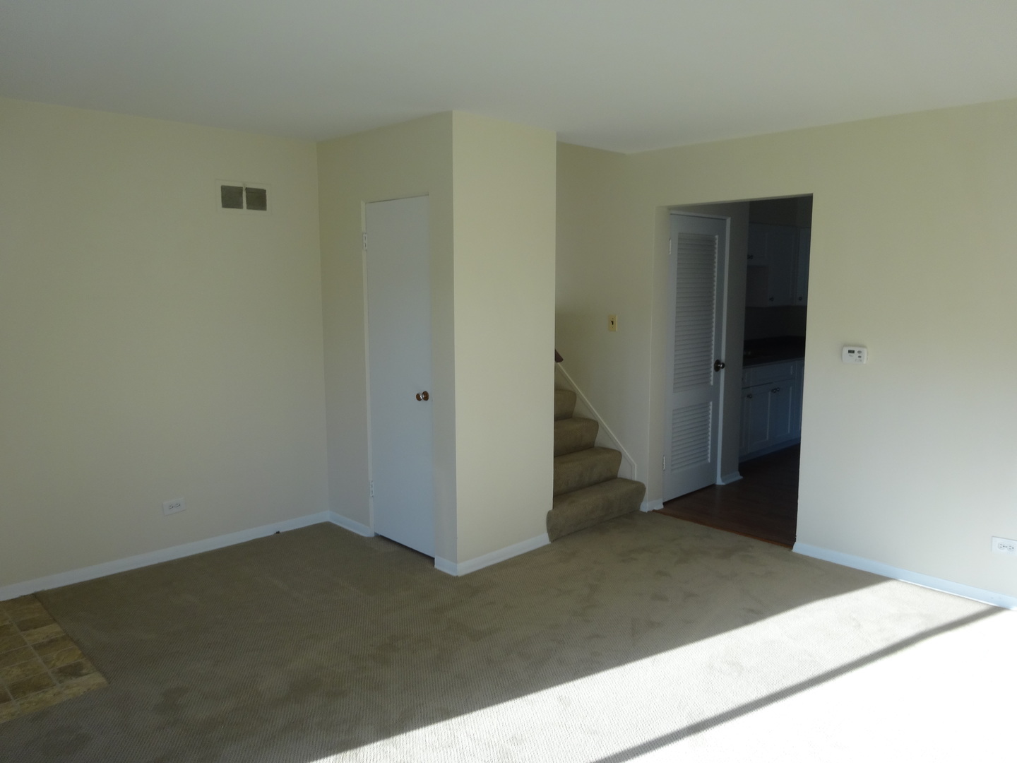 961 Spring Road Elmhurst, IL 60126 - Photo 9 of 24 an empty room with wooden floor
