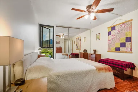 a bathroom with a granite countertop sink a shower and a mirror